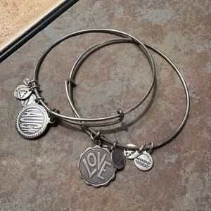 Two Alex & Ani LOVE and LAUGH silver tone bangles